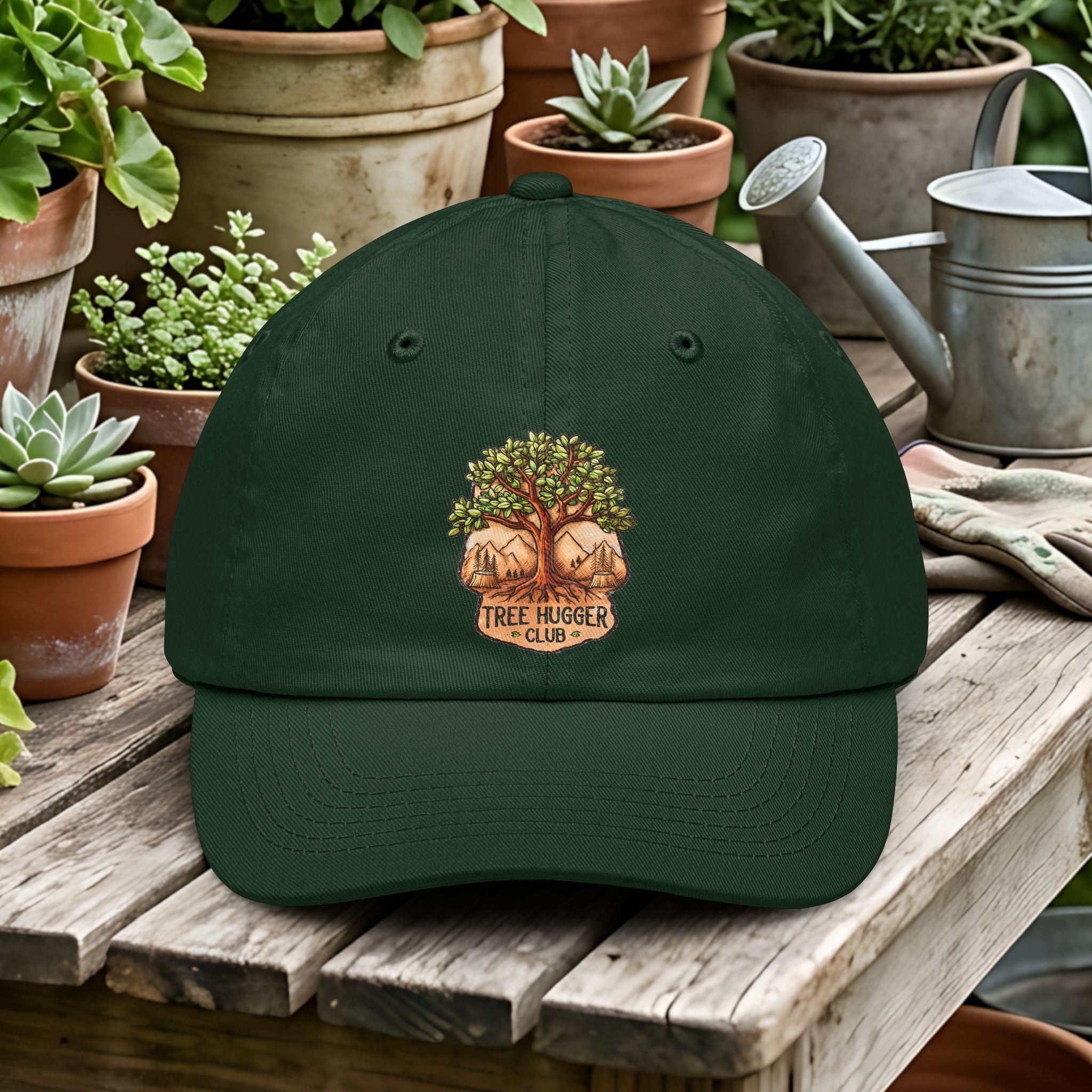 Black cap with 'Tree Hugger Club' logo on a wooden table with potted plants and gardening tools.